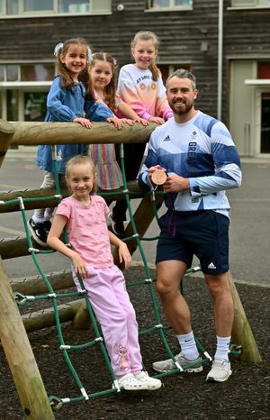 The visit by Olympic medallist Kristian Thomas was the final treat for pupils after their enrichment week. He is pictured with Rachel Jones, Evie Rose-Payne, Elsie Masion and Ella Howells