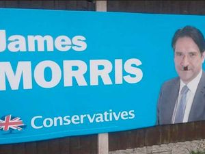 Supporting image for story: Conservative candidate James Morris' election posters defaced with Hitler moustache