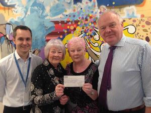 From left, Dr Stephen McKew Clinical Director for Oncology and Haematology, Bernadette's sisters Christine Hayward and Anne Winn, and Dr Nigel O'Connor Consultant Haematologist.