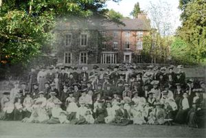 People gather outside what is now the Valley Hotel. 