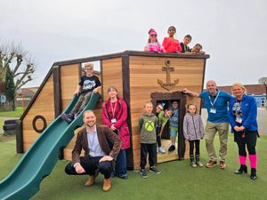 Headteacher Mrs Fellows and Councillor Adam Davies with pupils at Brook Primary School