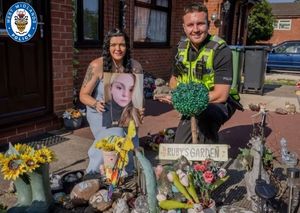 Officers have helped return ornaments stolen from the memorial garden. Photo: West Midlands Police 