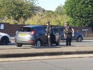 Police at the scene on Willenhall Road. Photo: Dee Ward