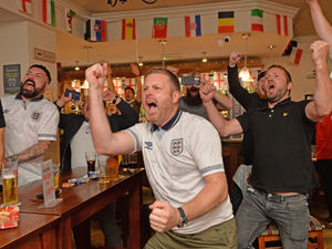 Supporting image for story: Drink it in: Pub fans roar England through to Euro 2020 final - in pictures