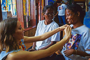 Natalie meets acid attack victims in India as part of her documentary Not in Vain