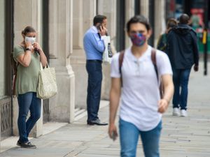 Supporting image for story: Face coverings do not lead to a false sense of security, experts claim