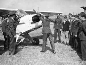 Supporting image for story: 'The NHS: a national treasure, but not without its flaws' - your letters, plus George Bickley teaches cadets to fly in a 1940s throwback
