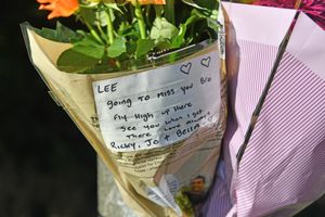 Tributes sit near the junction with Birmingham New Road, Oldbury