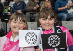 Young supporters, Amanda Murdock, aged 8, and Emily, aged 9, loved the match! Credit: Jim Wall. 