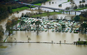 This aerial shot shows flooding over Bridgnorth and surrounding areas, making submerged mobile homes look more like boats
