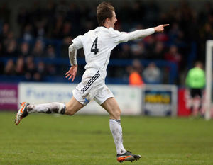 Neill Byrne of AFC Telford United celebrates after scoring a goal to make it 2-0