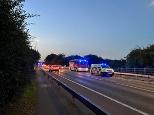 Supporting image for story: Emergency services in operation by River Severn in Shrewsbury