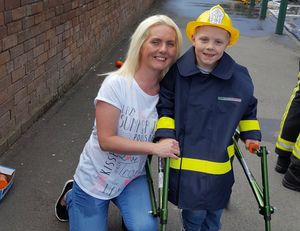 James with his mother Cheryl Hughes