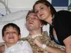 Supporting image for story: Injured county soldier commended