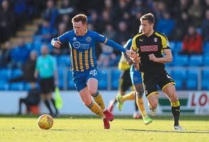 Jon Nolan of Shrewsbury Town and Will Vaulks of Rotherham United. (AMA)