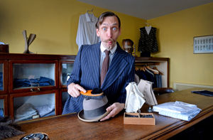 Matt Adams makes sure the clothing is in good order in Morrall's menswear shop