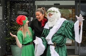 Moli Jones the elf, Hotel General Manager Becky Shields and Father Christmas.