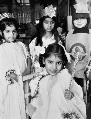 The caption reads: 'Heading for stardom? These four young actresses caught our photographer's eye during the nativity play at St Giles's Nursery School, Walsall Street. They are, from left, Jasbinder Kaur (3), Radha Kumari (4), Ravinda Kaur (3) at the front, and Marie Lloyd (4)' - December 21, 1979.