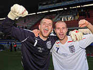 Supporting image for story: England duo star as Moore signs on
