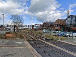 Supporting image for story: Emergency services called to reports of youths on disused railway bridge