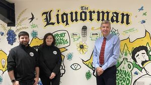 Mathew and Maria Hunter of The Liquorman with Rob Colbourne of Walsall Business Support