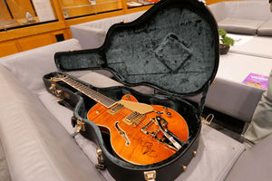 The guitar is from Led Zepplin frontman, Robert Plant's personal collection