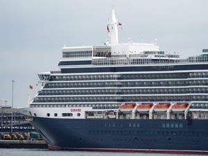 Supporting image for story: Cruise liner sails into port after crew members test positive for Covid-19