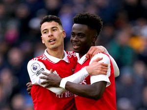 Bukayo Saka, right, and Gabriel Martinelli celebrate