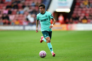 WALSALL, ENGLAND - JULY 30: Hugo Bueno of Wolverhampton Wanderers runs with the ball during the pre-season friendly match between Wolverhampton Wanderers and RC Lens at Pallet-Track Bescot Stadium on July 30, 2025 in Walsall, England. (Photo by Wolverhampton Wanderers FC/Wolves via Getty Images)
