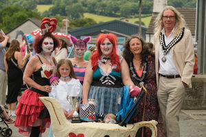 With their Mad Hatter's Tea Party entry, Clare Baguley, Alexia Lanphier-Smith, Emma Lanphier-Smith, Nicky Lowe and baby Pippa won the best decorated pram and pushchair category. Here they are pictured with judges Llandrindod Wells Mayor Councillor Steve Deeks-D’Silva and his wife Lauren. Pippa’s dad Paul Nally cleverly made the pram teapot.