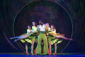 Kayi Ushe as Caterpillar plus ensemble. Photo by Paul Coltas