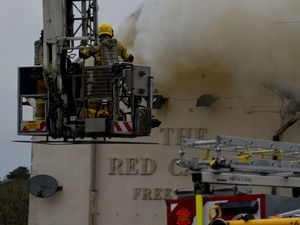 Supporting image for story: Dramatic pictures show firefighters battle Christmas Day pub blaze