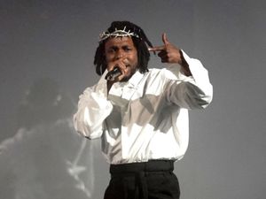 Kendrick Lamar performing on the Pyramid Stage at the Glastonbury Festival in 2022