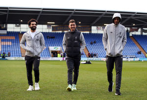 Mohamed Salah, Roberto Firmino and Fabinho on the pitch before the match

