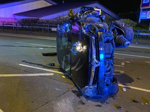 Supporting image for story: Pair injured after car flips onto side in Brownhills crash