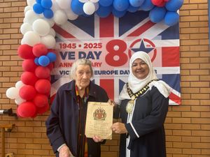Betty Johnson and mayor of Sandwell Councillor Syeda Khatun deliver the peace cards to St Paul's CE Academy in Tipton