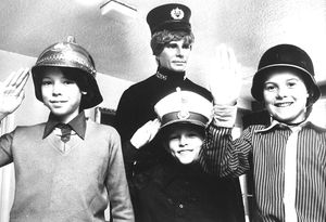 September 1980: 'Three young bade enthusiasts take a salute. The boys were enjoying the action at a swop meeting of the West Midlands branch of the British Badge Collectors Association. The lads are from the left, 13-year-old Paul Moss wearing a Greek Helmet, ten-year-old Mark Moss (Austrian), ten-year-old Carl Ault (German) and their "friend" wearing the uniform of a Staffordshire police inspector from 1910.
