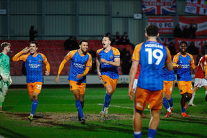 Will Boyle celebrates scoring Shrewsbury Town's winner