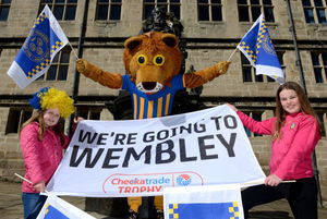 Lenny the Lion ready for the big game with Neve and Abbie Evans
