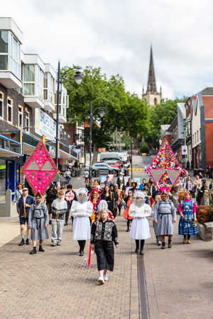 Artist Tereza Bušková leads the procession through Walsall town centre on Saturday.