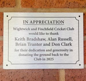 The plaque thanking the four men for their 'dedication and generosity'