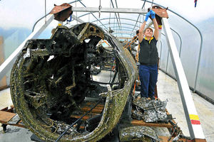 Laura Pringle carrying out restoration work at Cosford