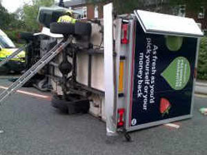 Supporting image for story: Supermarket truck collides with car