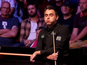 Ronnie O'Sullivan puffs out his cheeks