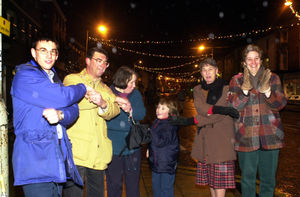 Andrew Davies (26), Malcolm Davies (54), Karen Foreman (39), Carrie Foreman (7), Sylvia Davies (57) and Carol Simmonite (24) sing Auld Lang Syne in Newport