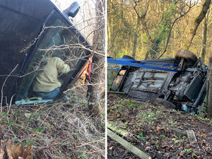 Supporting image for story: Video reveals how trapped teenagers were saved from rolled car balanced on riverbank 

