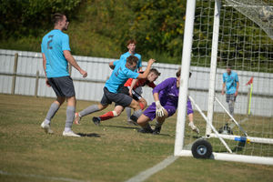 Ludlow’s Harry Jones scrambles home the opening goal for Ludlow against Wellington. (Image by Trevor Patchett)