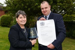 Sonia Roberts MBE and Phil Taylor of Landau recieving the queens award for Enterprise