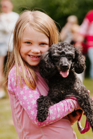 Eadie Kimberley, six, and Tilly at the Loggerheads Doggy Day Out