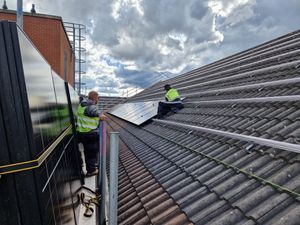 Rooftop solar panels being installed at Guru Nanak Gurdwara Smethwick